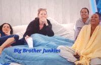 They watch Lisa walk through the house.