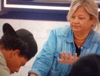 Angela let Cedric paint her nails.