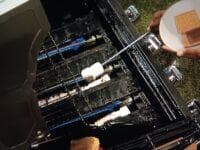 T’Kor roasting the mellow on a gas grill.