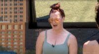 Rachel is leading a yoga class outside