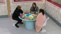 Final 3 playing some cards