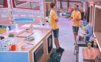 Daniel and Kyle chat in the kitchen