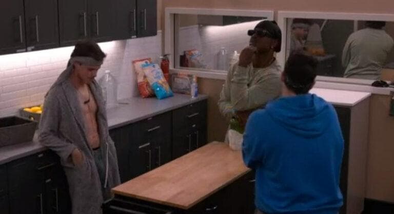 Izzy enters the room with Jared and Cory
