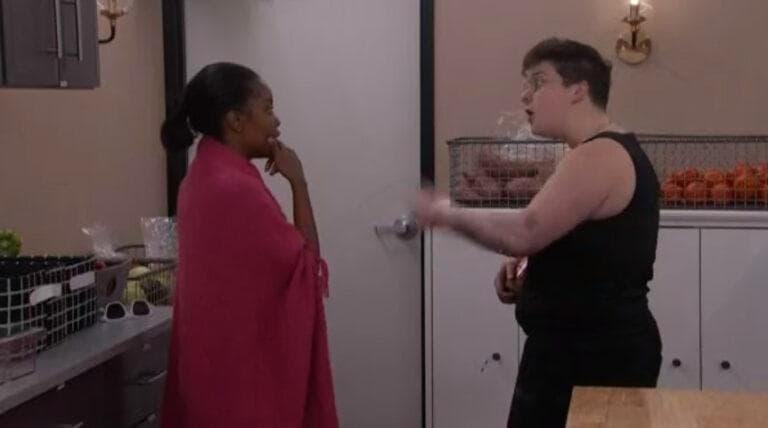 Izzy talking to Meme in the storage room